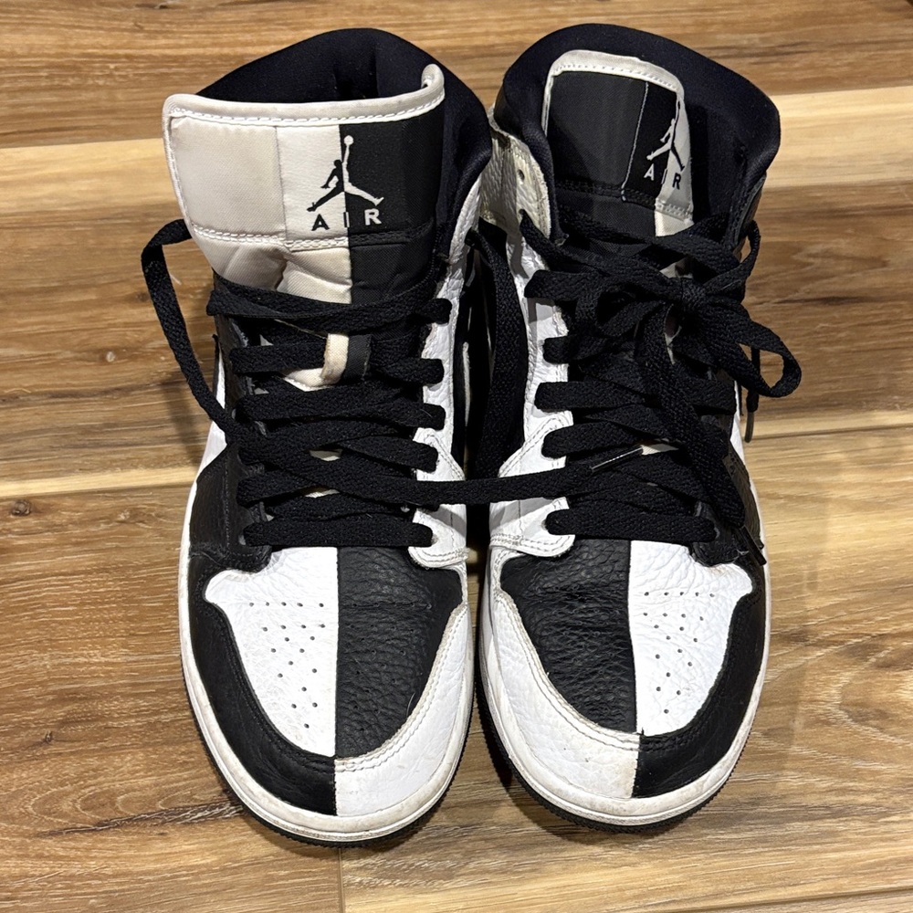 Black and white Nike Air Jordan’s